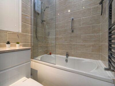 Bathroom - Bath with overhead shower Self catering cottage, Bangor North Wales